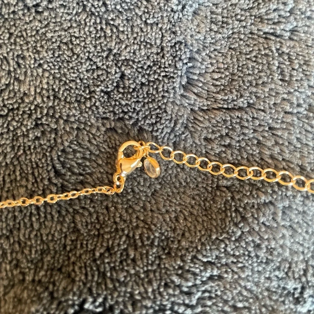 Gold unicorn heart and letter “A” necklace